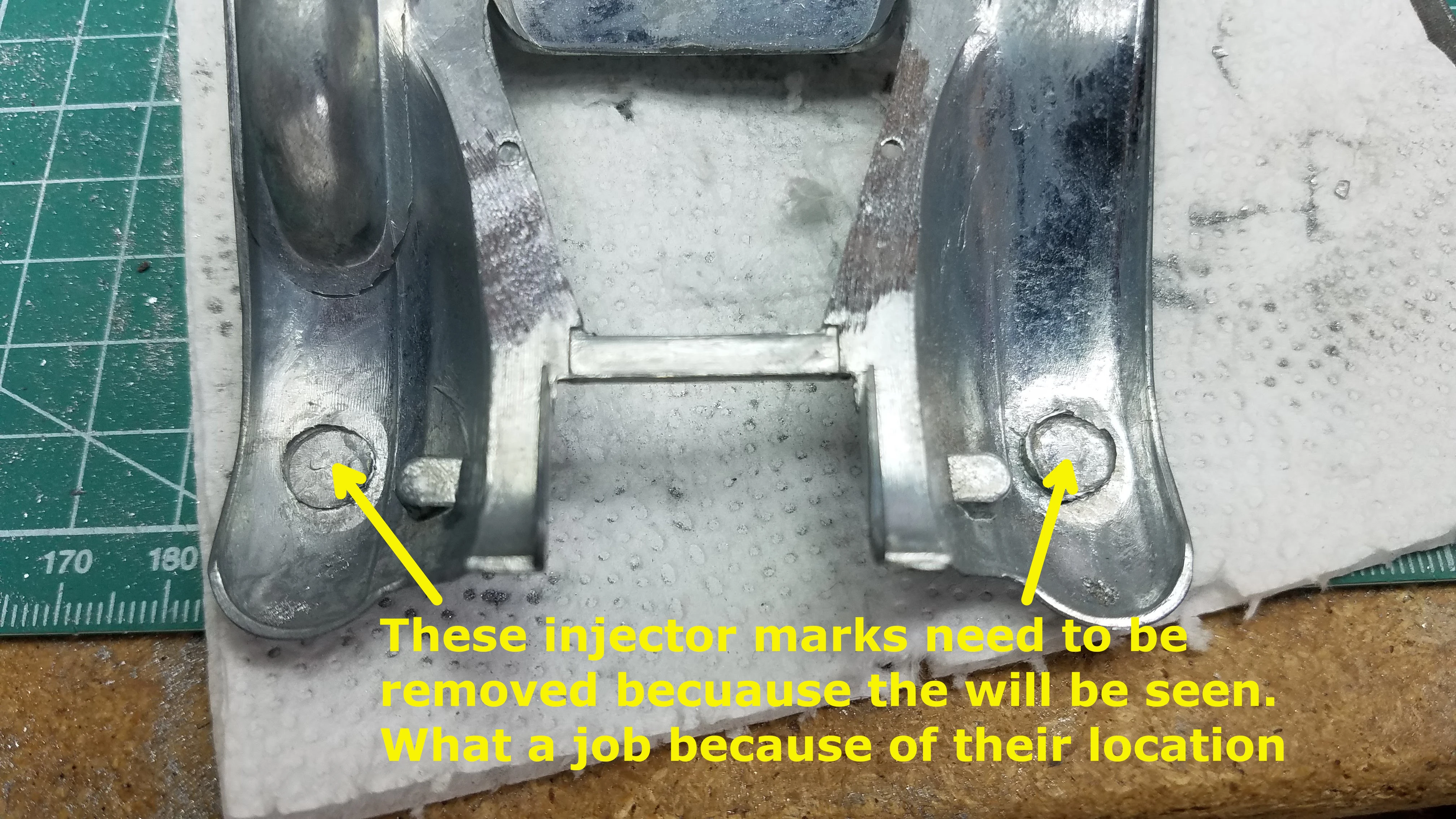 Large injector pin marks in the front fender wells