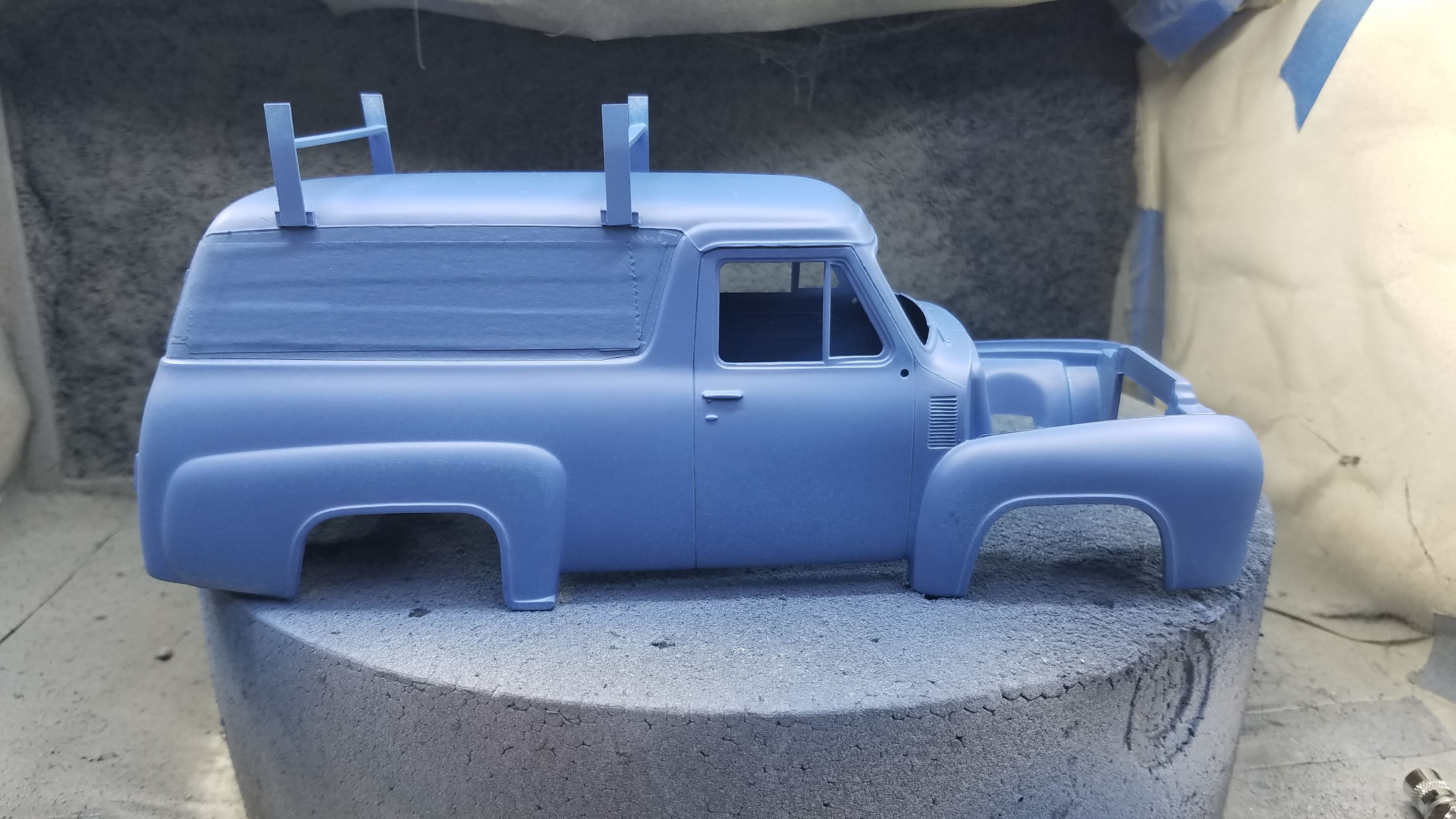 First coat of body color applied to body