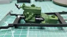 Engine mounted in frame and left side of engine detailed