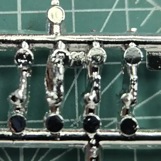 Engine shroud center hinge parts J21 on the sprue