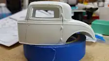 Body paint is stripped off