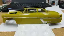 Starting to apply the body chrome
