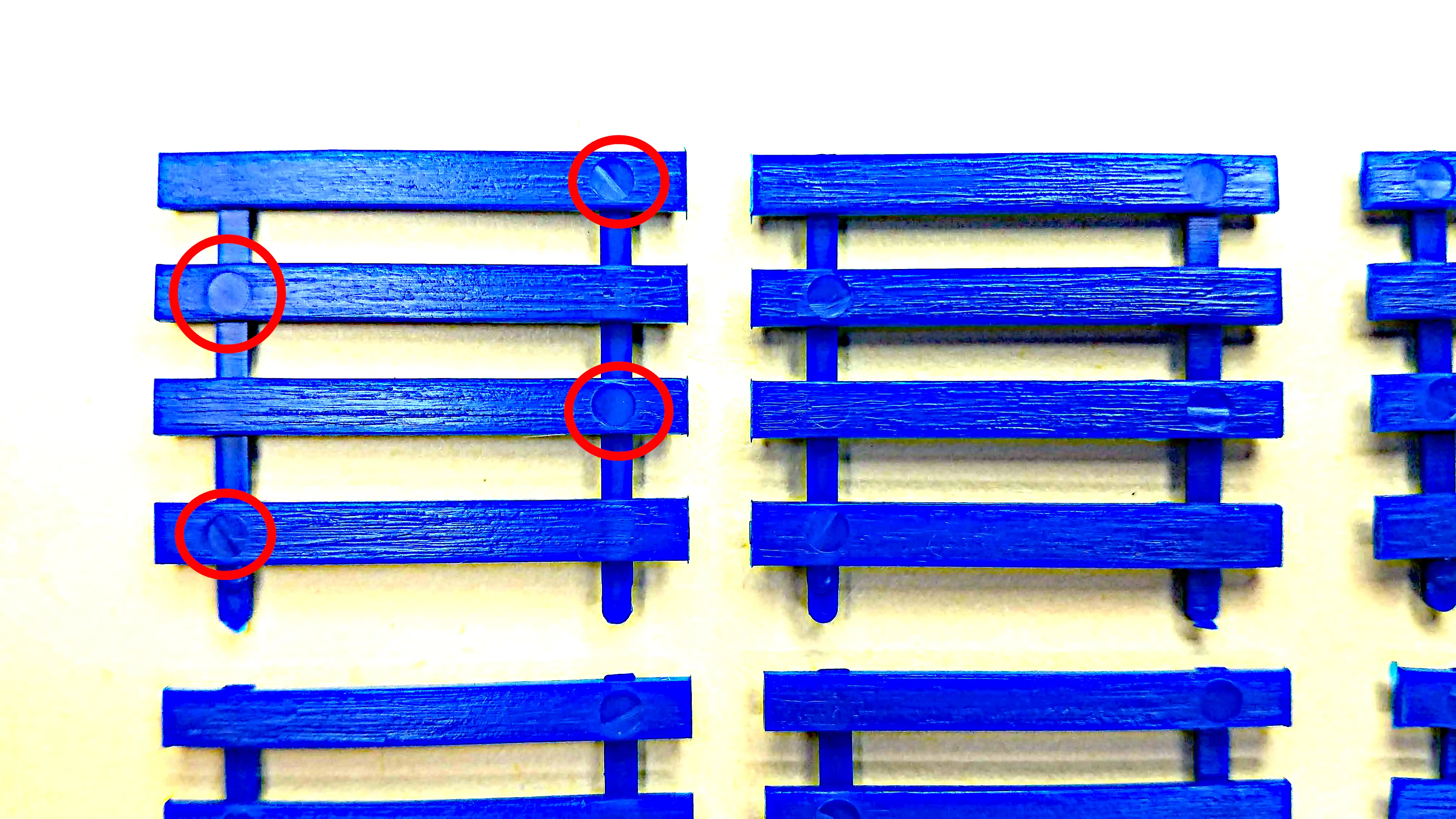 Stake rails showing mold ejector pin marks
