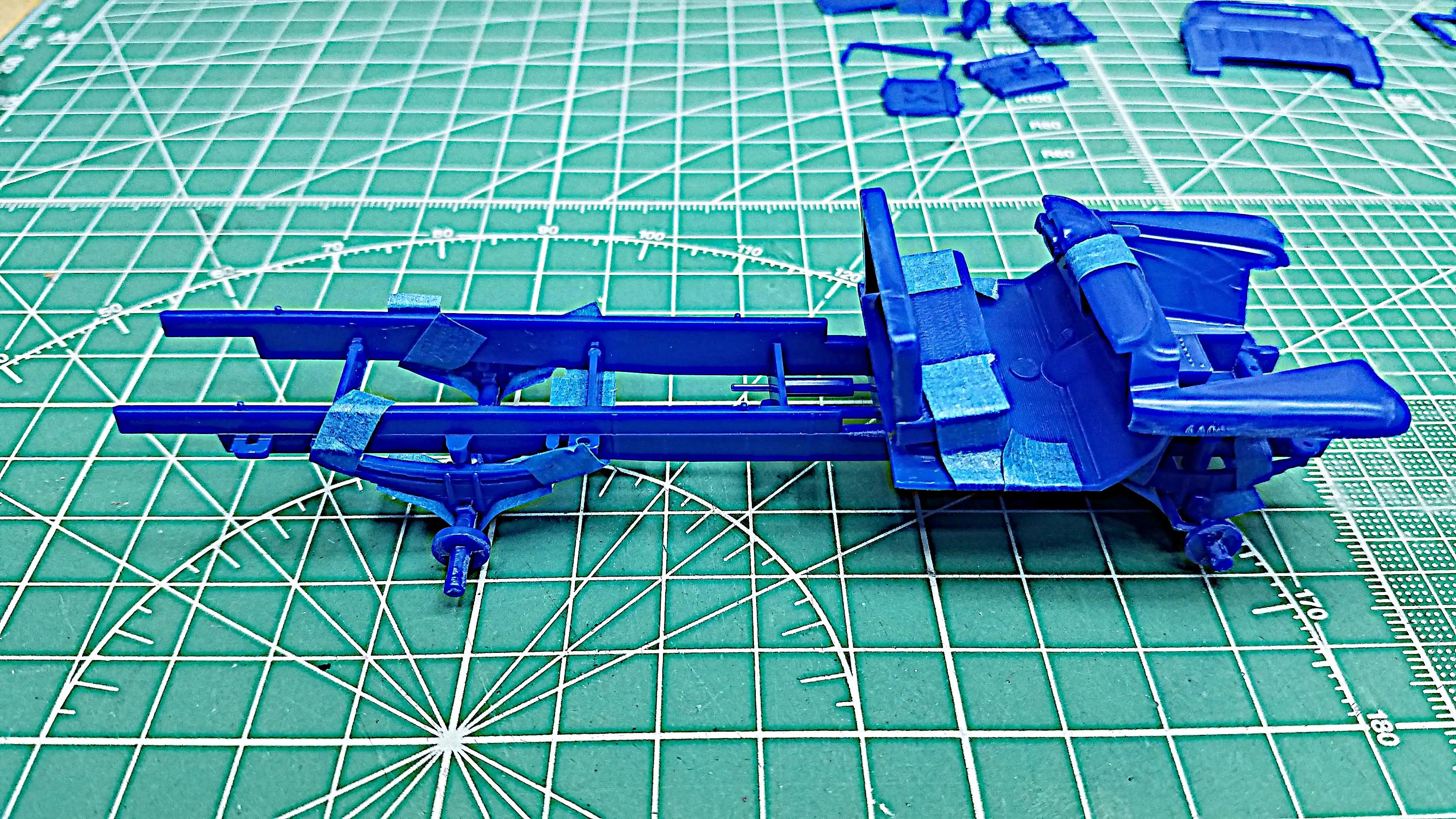 Dry fitting suspension, axles, interior floor and front 
				      fender assembly