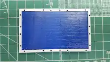 Holes are drilled on the bed frame for mounting the scratch built stakes