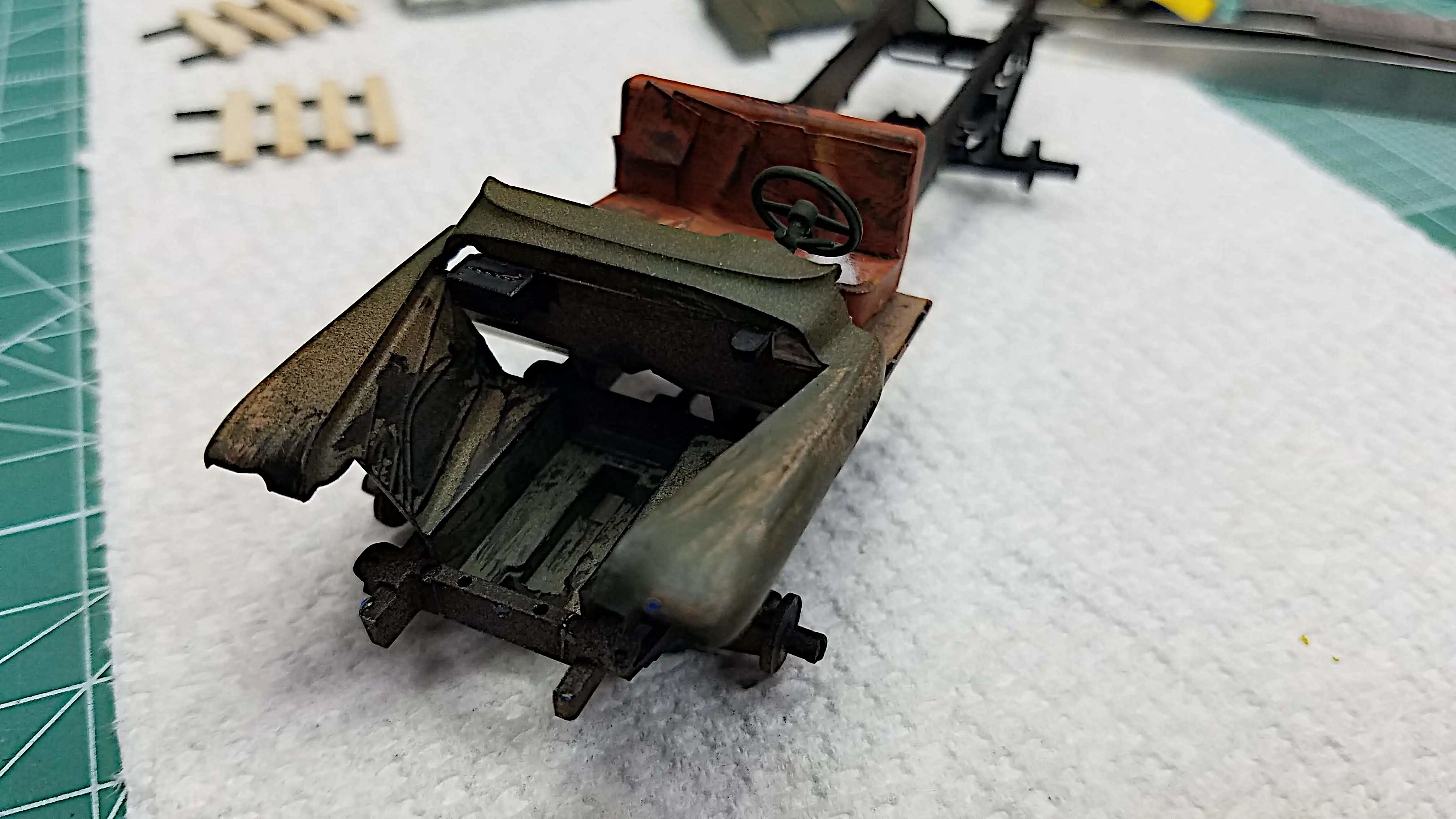 Interior floor, seat and front fender assembly installed
