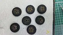 Tires and wheels are painted but not dirtied