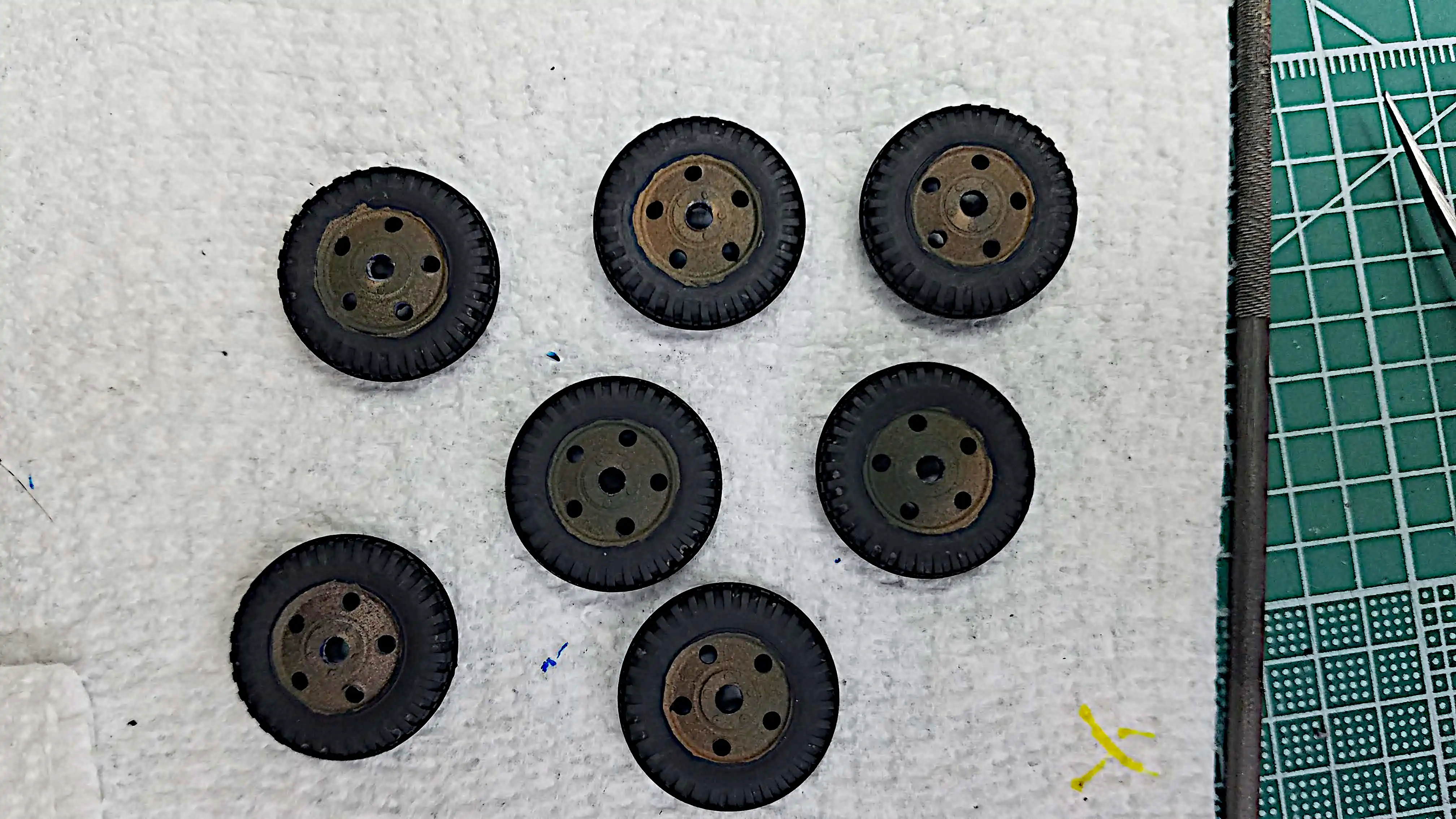 Tires and wheels are painted but not dirtied