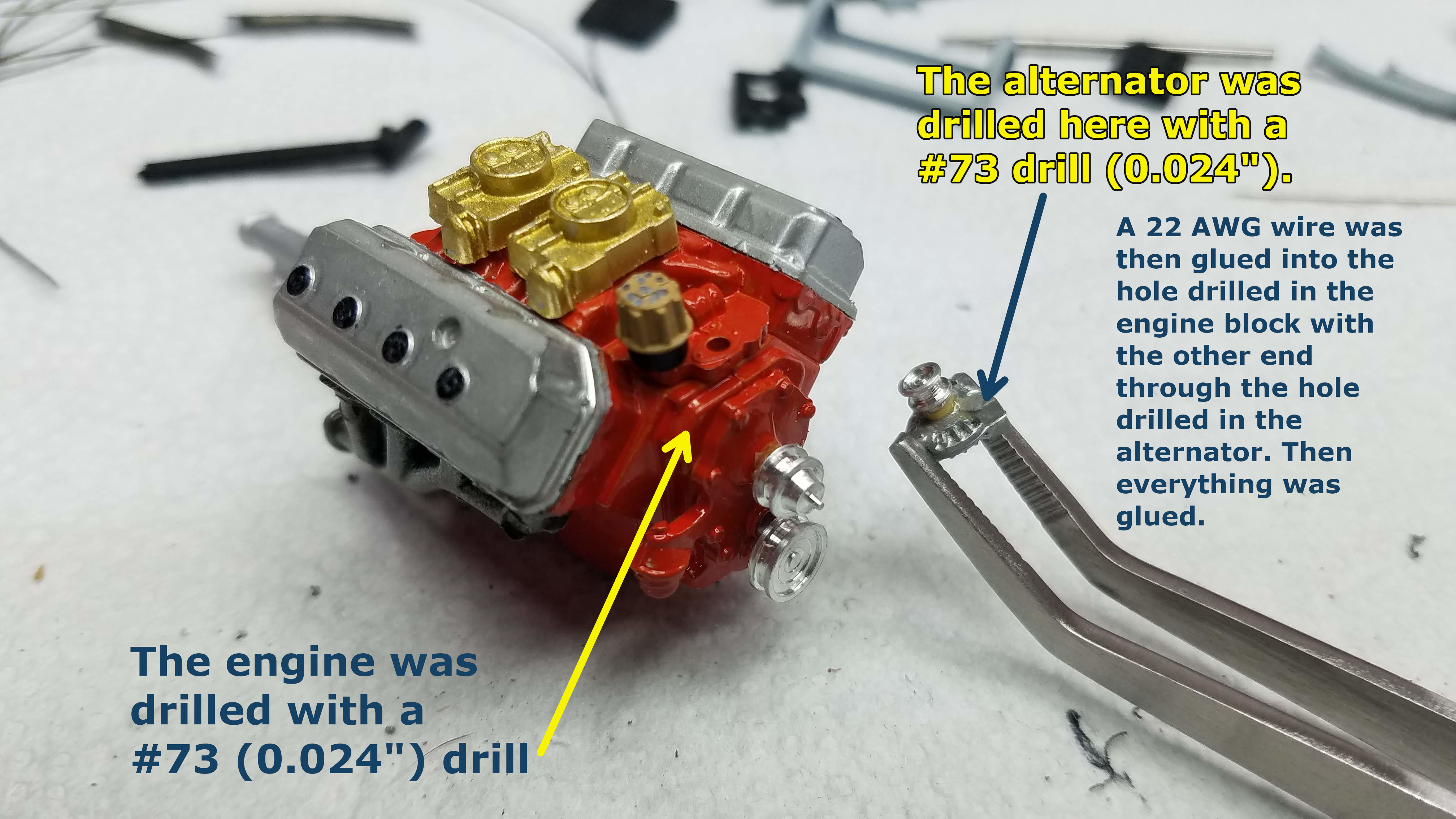 Water pump and alternator pulley mounted and engine drilled to mount alternator