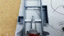 Transmission positioned on the new cross member
