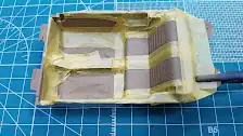 Interior tub masked to paint the back seats