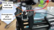 Battery hold-down and wires added