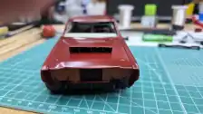 Front view with hood in place, but no bumper or grill