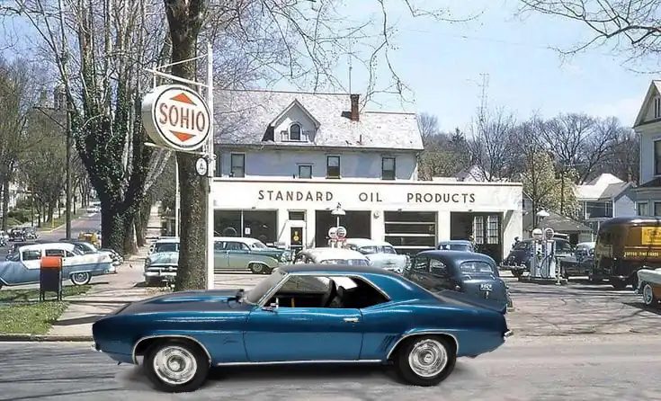 Finished car super imposed driving by Sohio Station