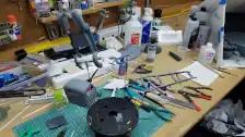 Parts from two kits being primed