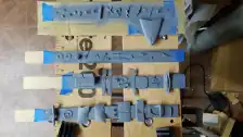 Parts from two kits being primed