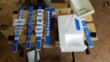 Parts from two kits being primed