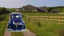Finished 1941 Plymouth Coupe superimposed in a scene