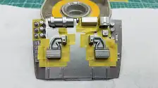 Engine shroud molded in parts are masked for painting