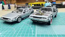 Both DeLoreans sided-by-side