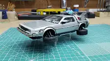Back to the Future II DeLorean with wheels in flying position, left side