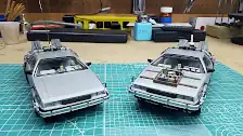 Both DeLoreans side-by-side