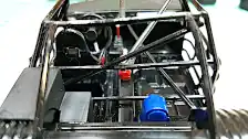 Dashboard is detailed, steering wheel and rear view mirror installed