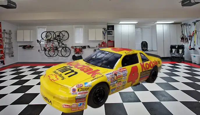 Ernie car in race garage