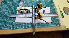 Gluing and clamping the wings in place