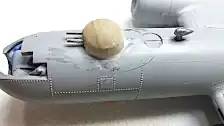 Filing and sanding the putty around the turrets
