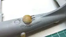 Filing and sanding the putty around the turrets