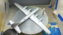 Airbrushed plane with natural aluminum